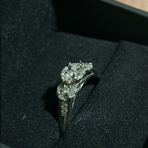 Half carat white gold engagement ring with transferable lifetime protection plan